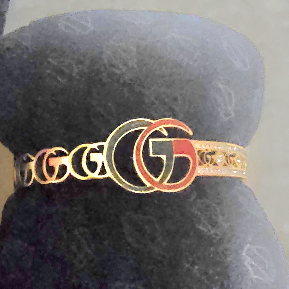 Gold and Black Logo Bracelet